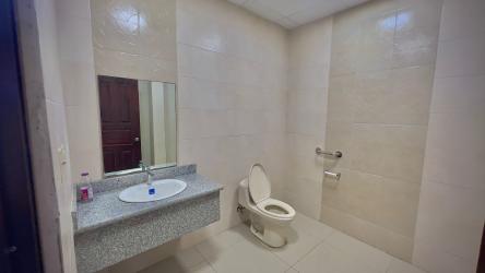 Bright modern office spaces with tiled floors and windows in commercial building Chitre