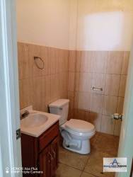 Glass storefront retail space with high visibility in banking district of David Panama