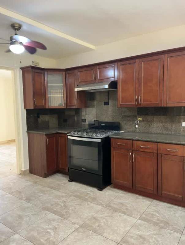 Bright living room with large windows tile flooring AC embassy gardens house clayton
