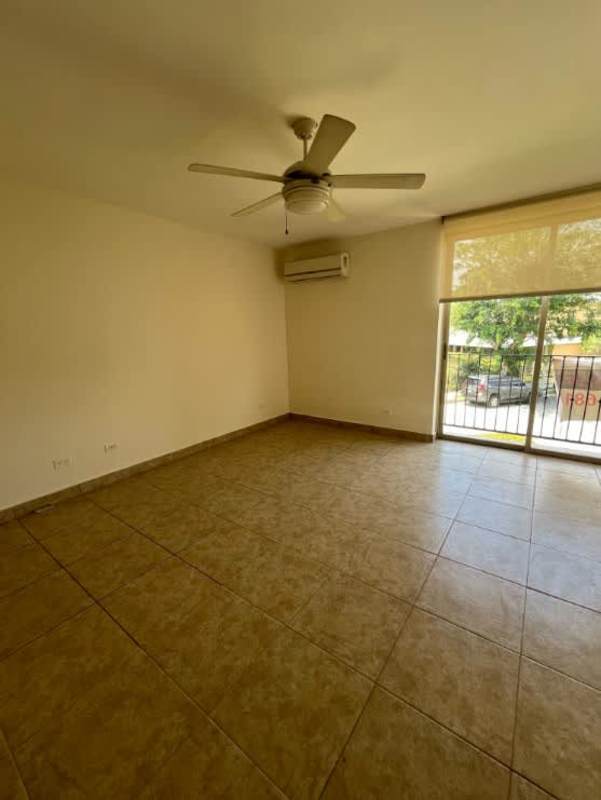 Large master bedroom big window AC ceiling fan in Embassy Gardens Clayton duplex villa Panama