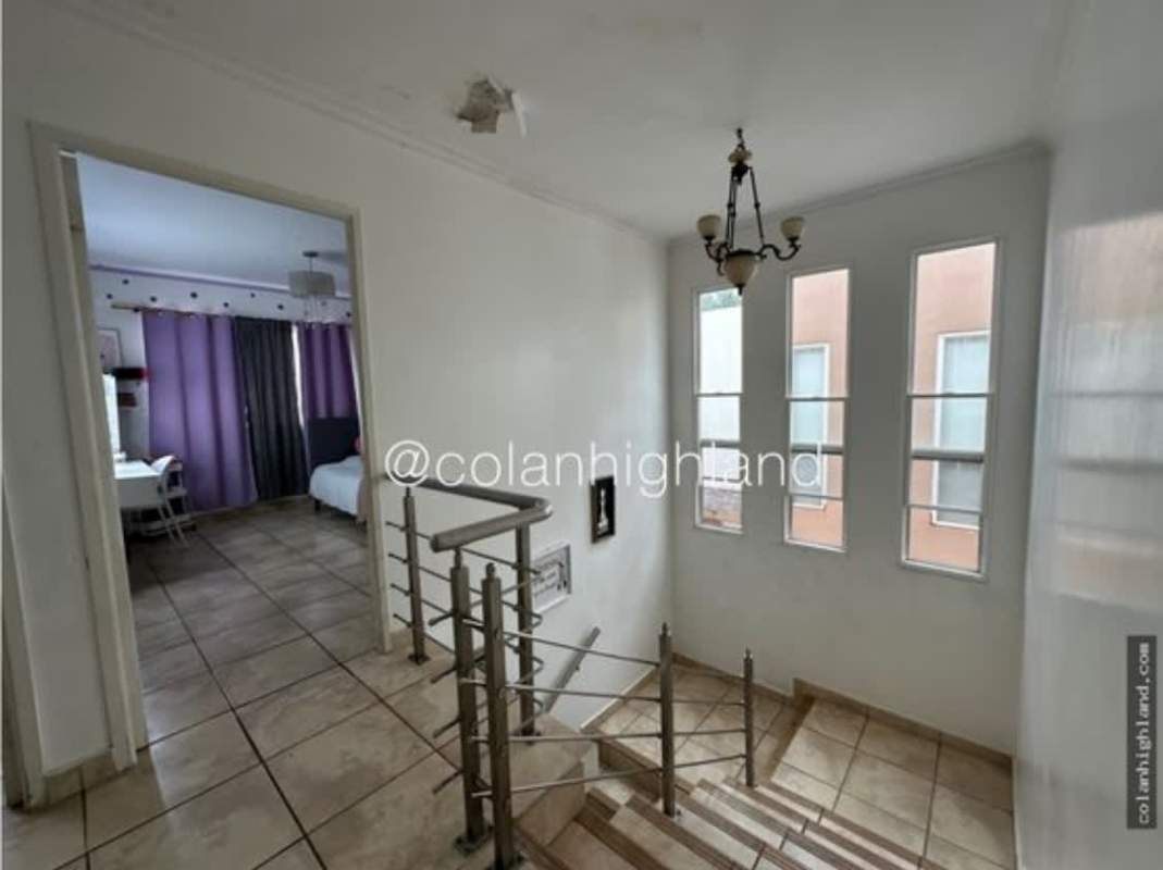 Interior stairway area with hallway and second floor bedrooms PH Everest Brisas del Golf Panama
