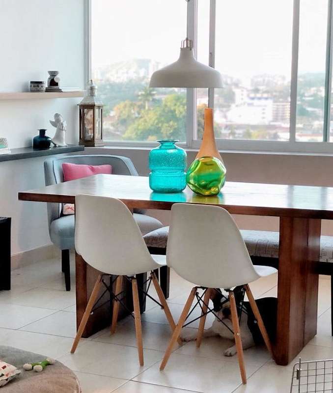 Bathroom with wooden vanity, modern lighting, double sinks at PH Vivendi Tower Panama City