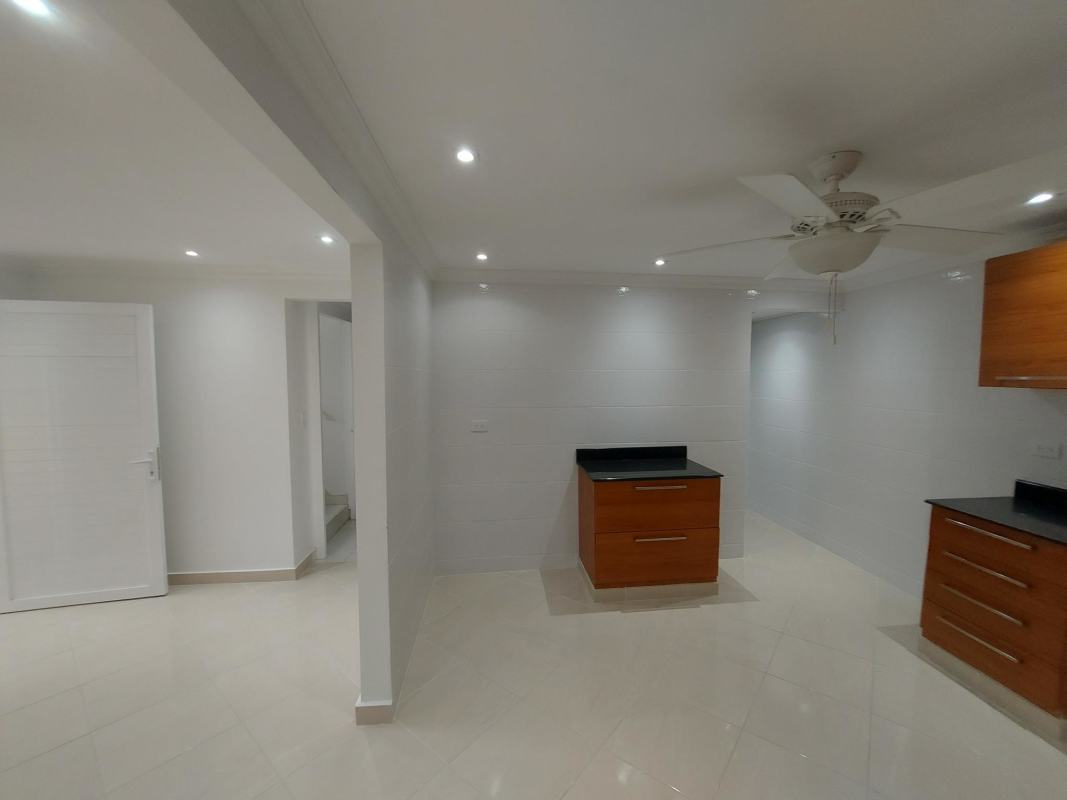 Master bedroom upstairs with walk-in closet and den area in Duplex Campo Lindbergh Panama