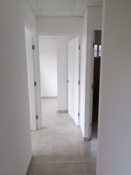 Bright hallway connecting bedrooms in Mystic City Costa Verde house for sale or rent