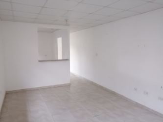 Simple kitchen with tiled walls and window Mystic City Costa Verde house