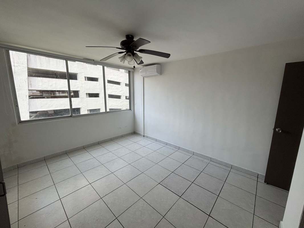Full bathroom with shower, pedestal sink, ventilation window at PH Via Porras Panama City