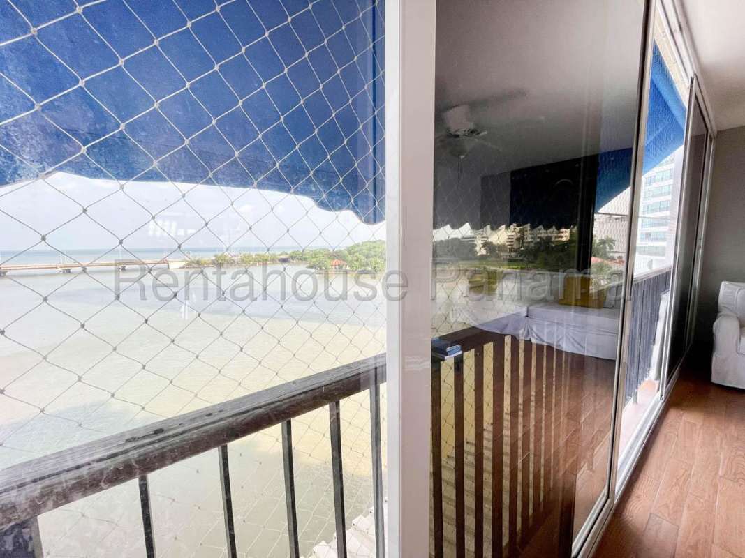 Private balcony overlooking Pacific Ocean and city skyline at Edificio Las Llamas Panama City