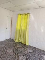 Bathroom with blue tiles pedestal sink and shower in rental room Gorgona near beach Panama