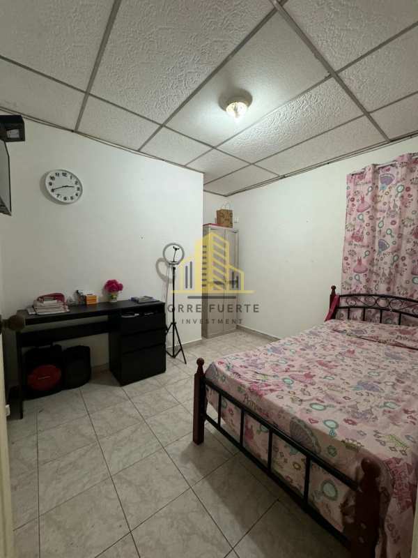 Simple bedroom with window and tiles Don Bosco Costa Sur Panama City