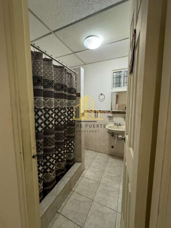 Basic kitchen with refrigerator and shelves Don Bosco Panama house