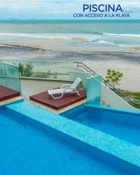 Infinity pool overlooking the Pacific Ocean with glass railing at PH Corona Resort Playa Corona Panama