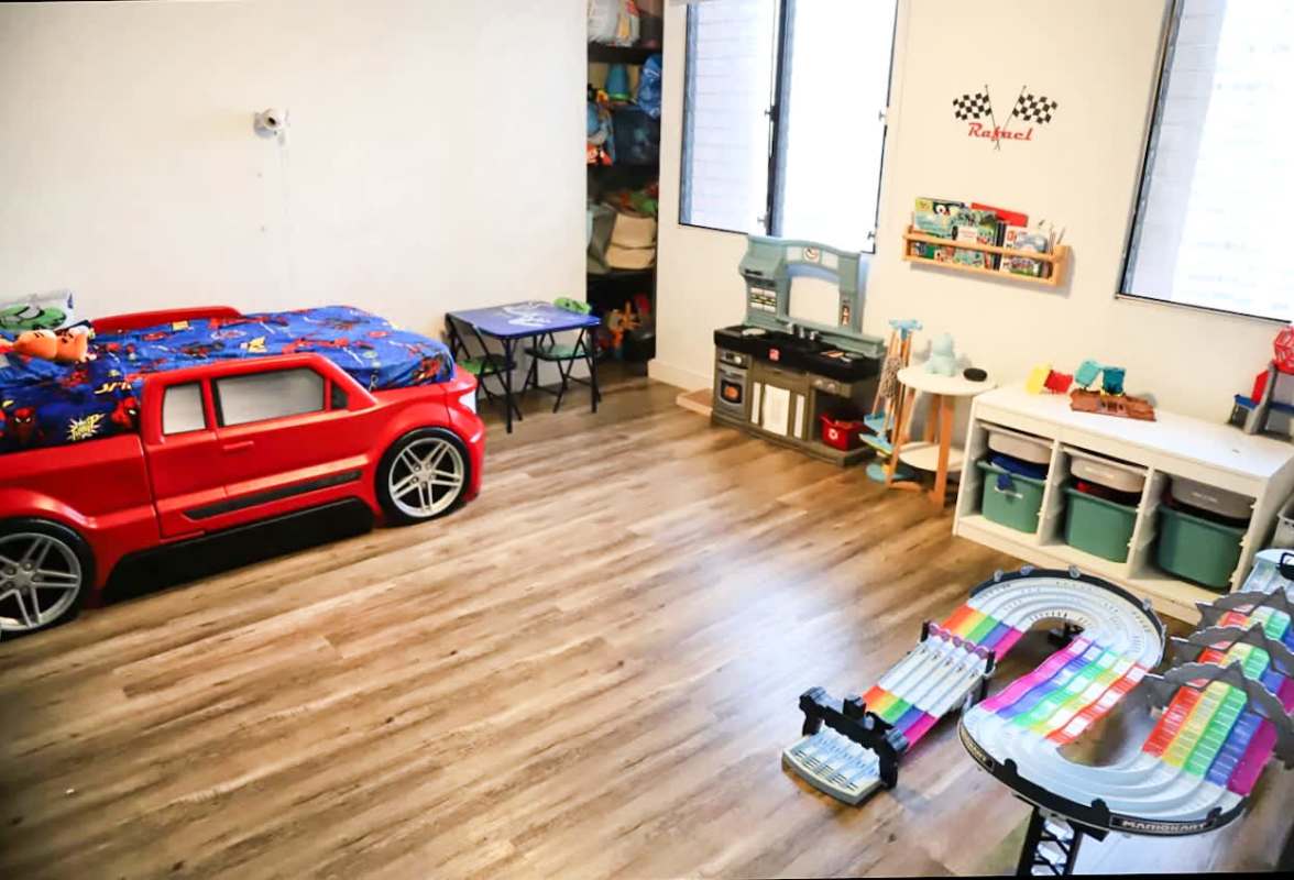 Children's bedroom and playroom with colorful car bed, toys at PH San Francisco Country Park