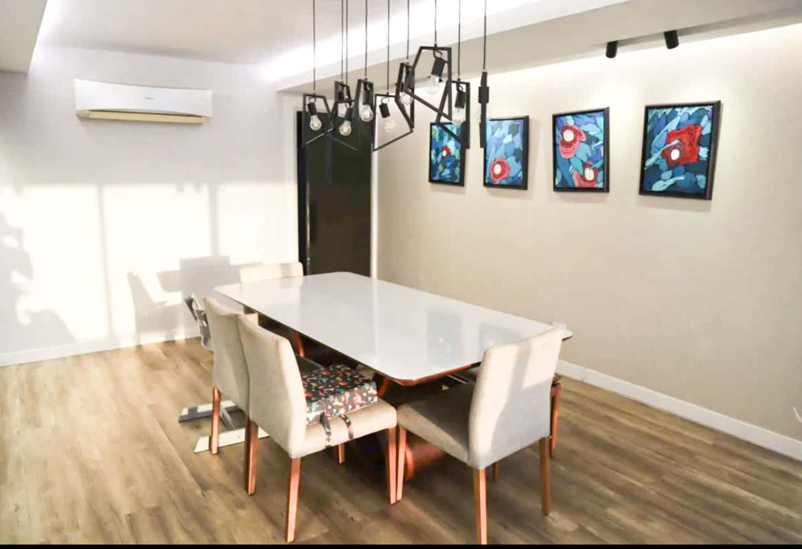 Dining area featuring pendant lights and art decor PH San Francisco Country Park Panama