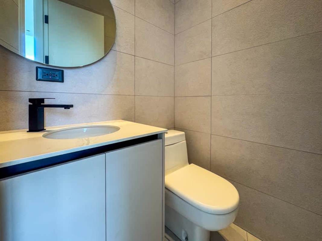 Luxury high-rise condominium facade with balconies PH Grand Tower Punta Paitilla Panama