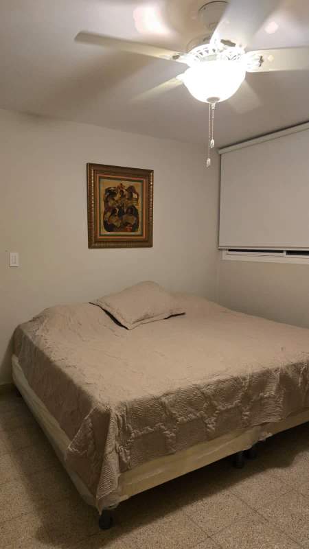 Built-in wardrobe with art pieces and lighting PH La Cresta Panama