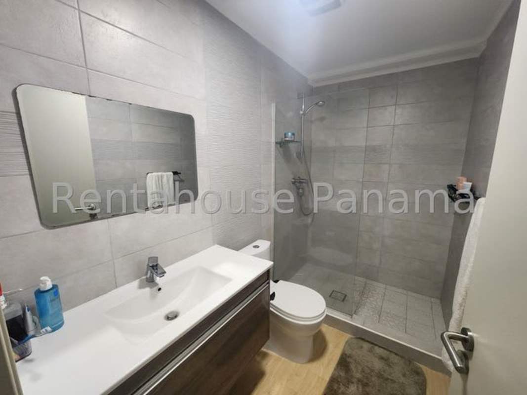 Open kitchen design with dining area and ocean view in Coco del Mar condominium Panama