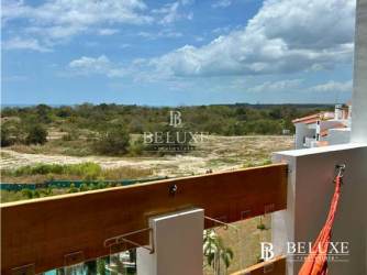 Furnished master bedroom with ocean view window Playa del Sol Rio Hato Panama