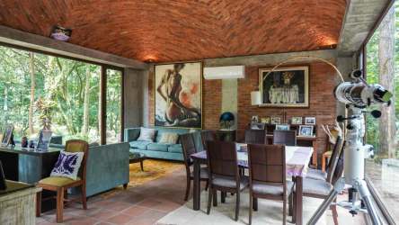 Terrace dining space overlooking tropical garden Altos del María Panama