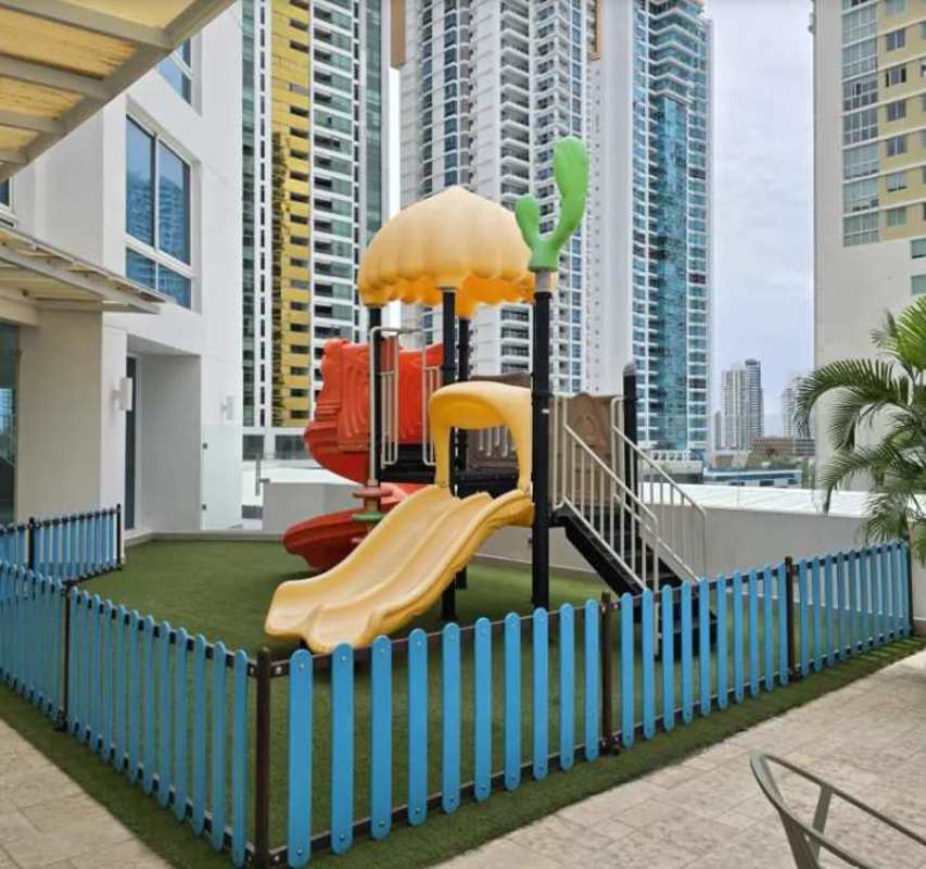 Playground on podium level at PH Castellammare with city views Panama City