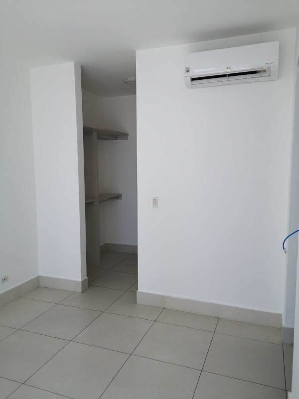 Empty bedroom with AC, tile flooring, walk-in closet in Costa del Este Tower