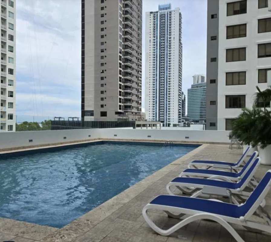 Terrace balcony overlooking high-rises and Pacific Ocean in Costa del Este