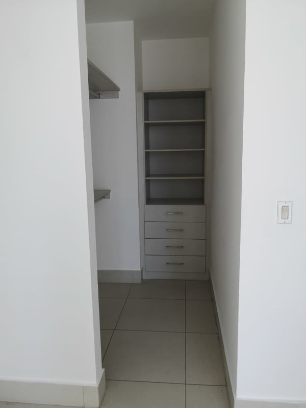Full walk-in closet with drawers shelves in PH Castellammare Panama