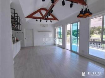 Modern farmhouse open plan living-dining with exposed beams opening to terrace PH Rodman Bijao Panama