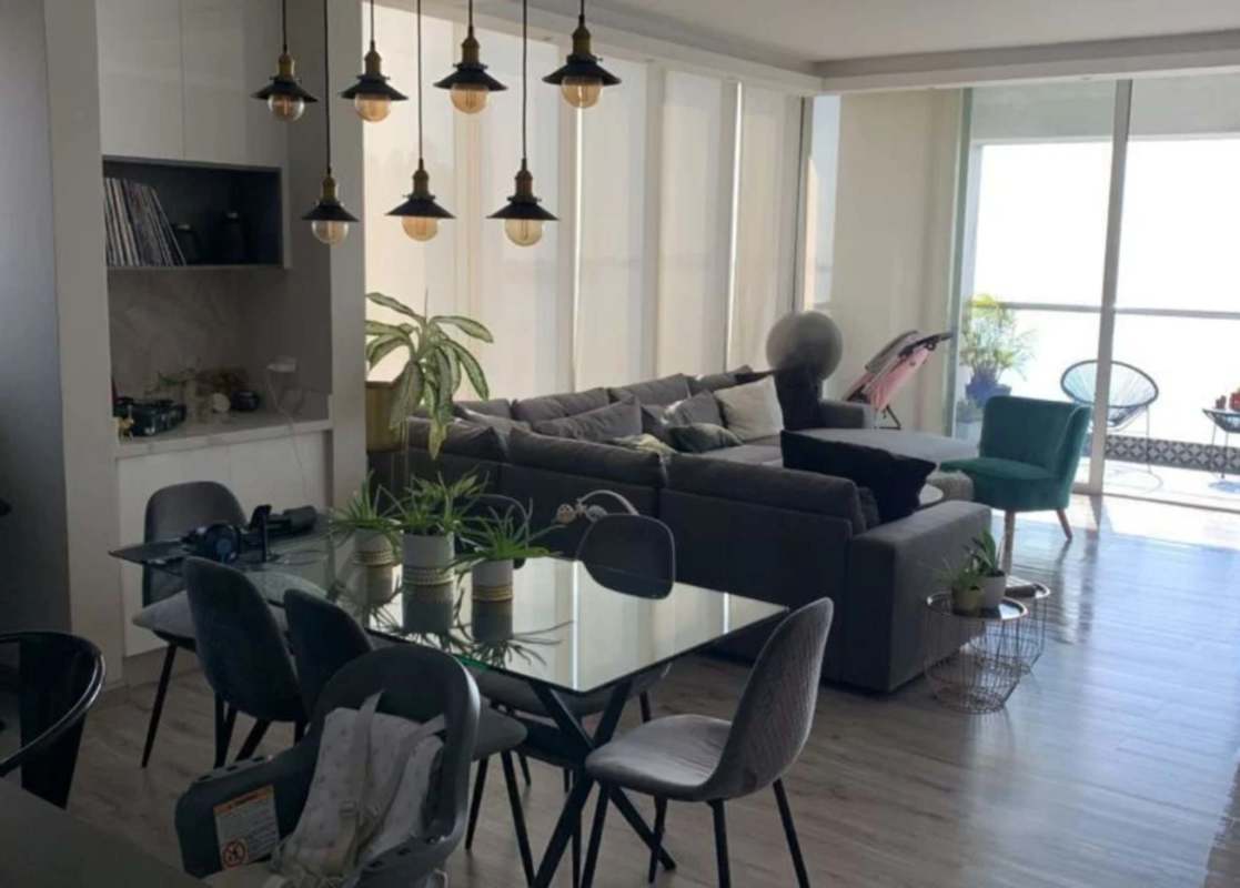 Living room with large windows Pacific Ocean view ceramic flooring at PH Rivage Panama