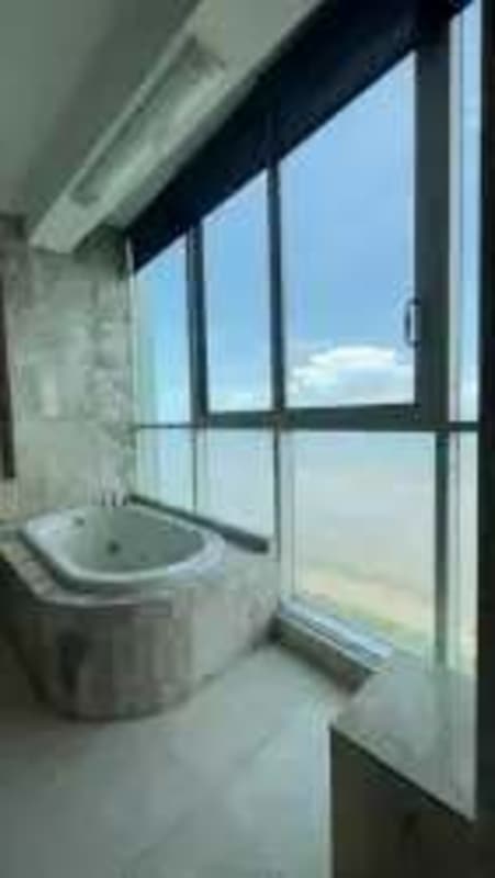 Elegant bathroom with double vanity marble countertops PH Ocean Two Costa del Este Panama