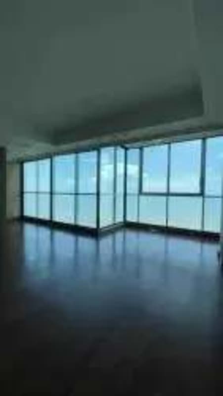 Elegant living area with polished tiles and panoramic ocean and skyline views PH Ocean Two Panama