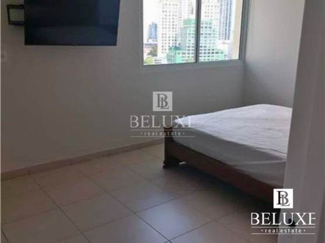 Bright second bedroom with tile floors in PH Terramar Panama City