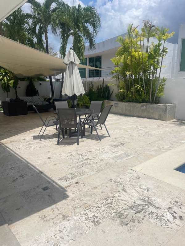 Spacious double height living area with contemporary decor and natural light in Costa Esmeralda Panama