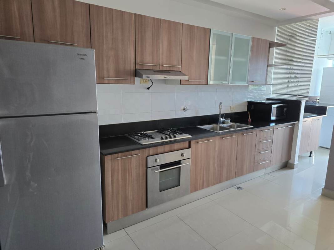 Bright hallway with modern tile floors and accent wall in PH Diamond Tower San Francisco