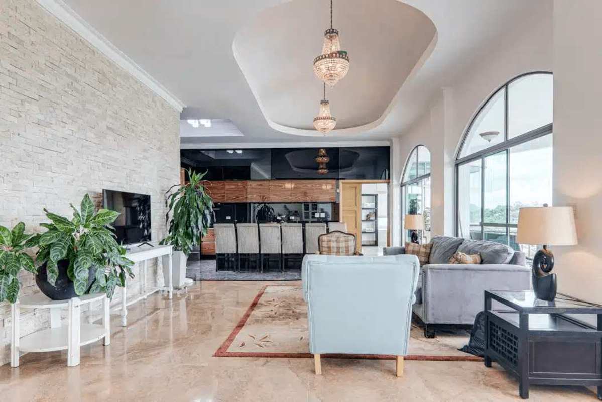 Spacious open living-dining area with water views penthouse at PH Amador Heights Panama