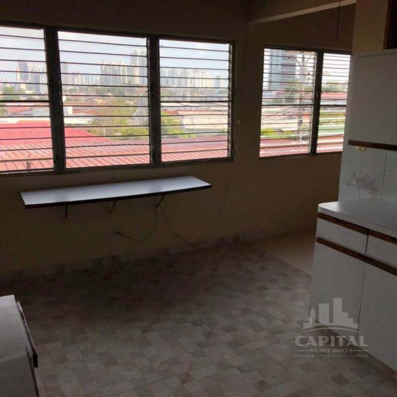 Bedroom with large wardrobe, ceiling fan and tiled floor Betania Panama house