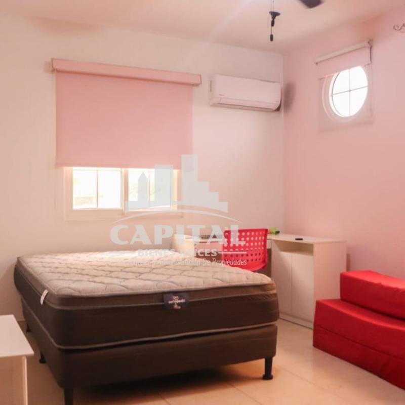 Large living and dining space with double height ceilings, ample natural light at Rainforest Villas in Panama City