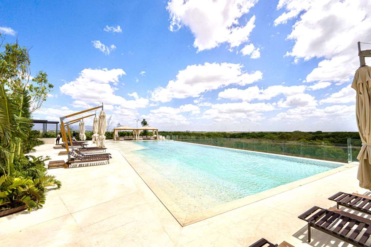 Luxurious bathroom with marble, freestanding bathtub, glass shower, panoramic views at Fendi Chateau Panama