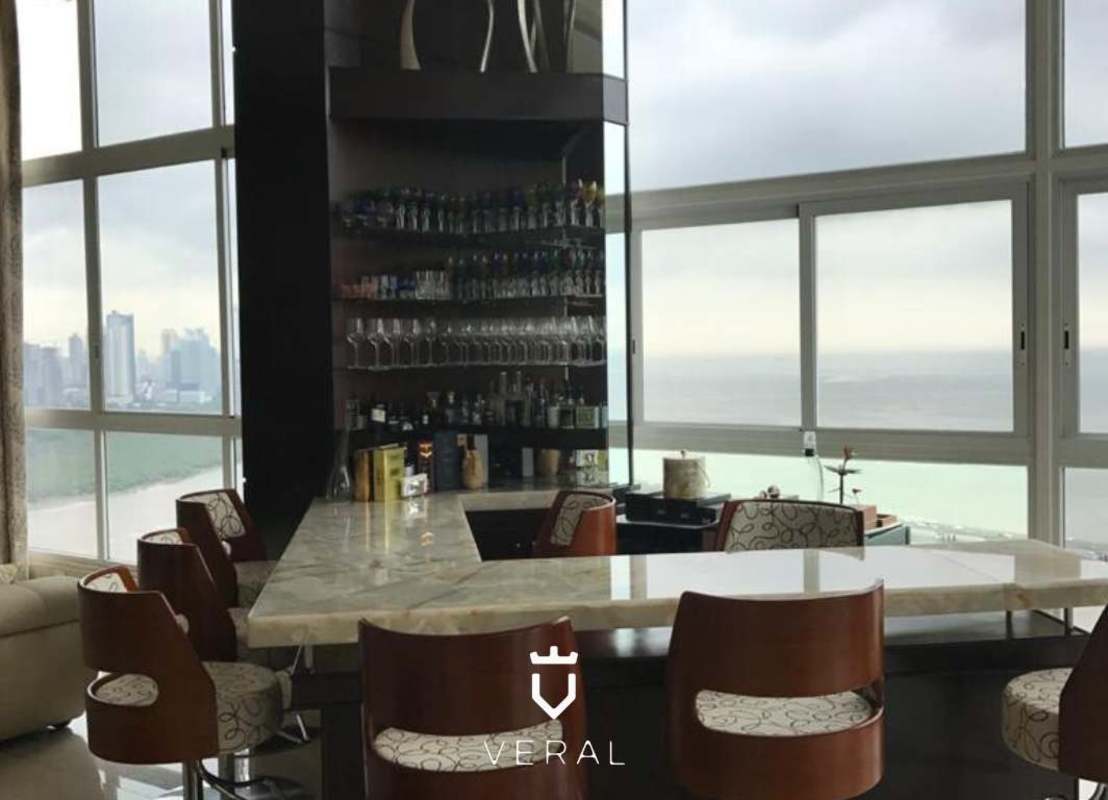 Home bar area with panoramic ocean windows PH Puntarenas Coco del Mar