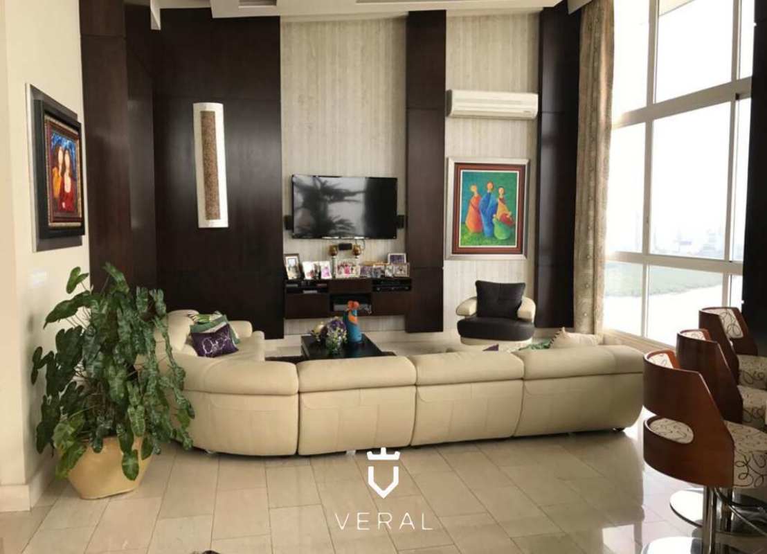 Elegant lounge with full wall windows and views PH Puntarenas Coco del Mar