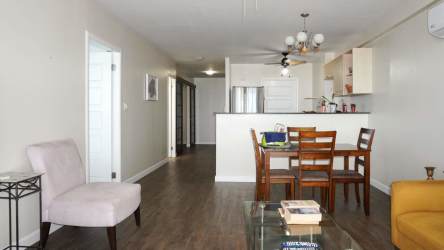 Open living dining room with large windows overlooking Pacific Ocean PH Coronado Bay Panama