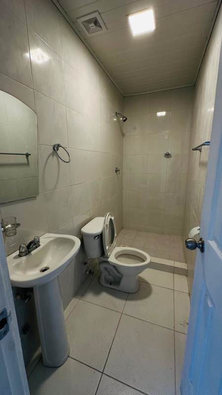 Bathroom with pedestal sink and shower Betania apartment Panama rental