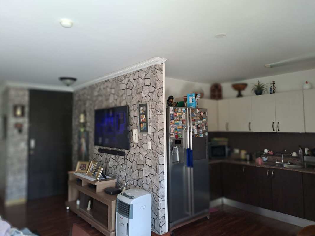 Kitchen with granite counters and ample cabinetry in PH Green Bay Costa del Este Panama