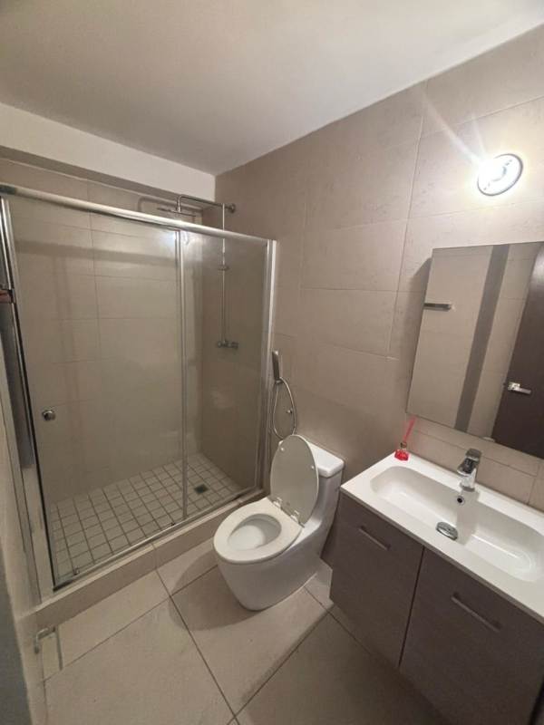 Infinity pool overlooking city skyline at PH Lumiere Costa del Este