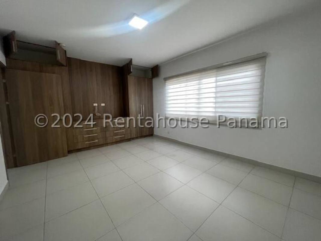 Modern bedroom with tile floors window blinds rental house Panama