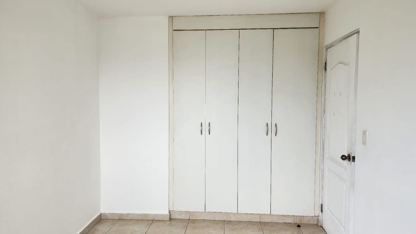 Corner bedroom with panoramic floor-to-ceiling windows with city and ocean views PH Vista del Mar Panama