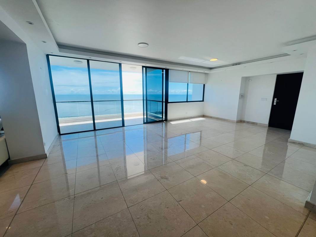 Contemporary kitchen with stainless steel appliances and granite counters overlooking Pacific Ocean.