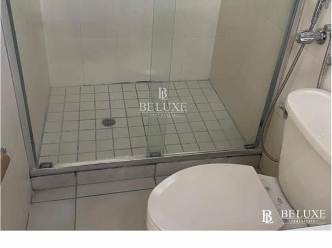 Bathroom with glass shower enclosure and ceramic tiles PH Torres Mar del Sur San Francisco Panama