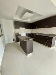 Unfurnished open plan living area with stairs PH Woodlands Panama Pacifico