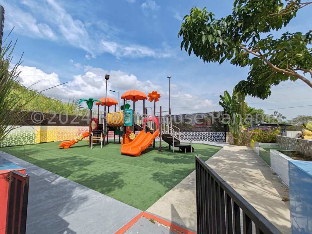 Living room with natural light and balcony access affordable condo Panama City