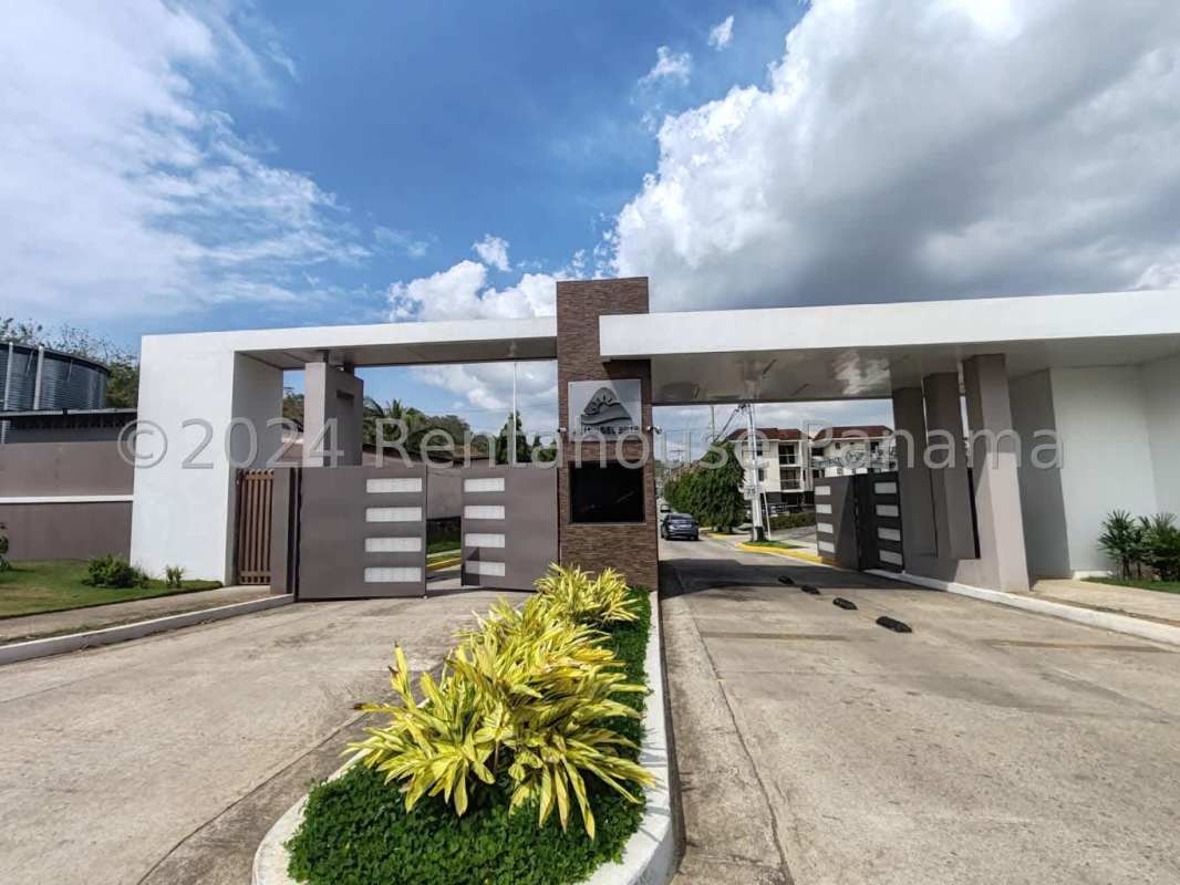 Controlled access gated entrance to PH Altos de Tocumen residential community Panama City